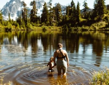 Mother and a son walking in a lake